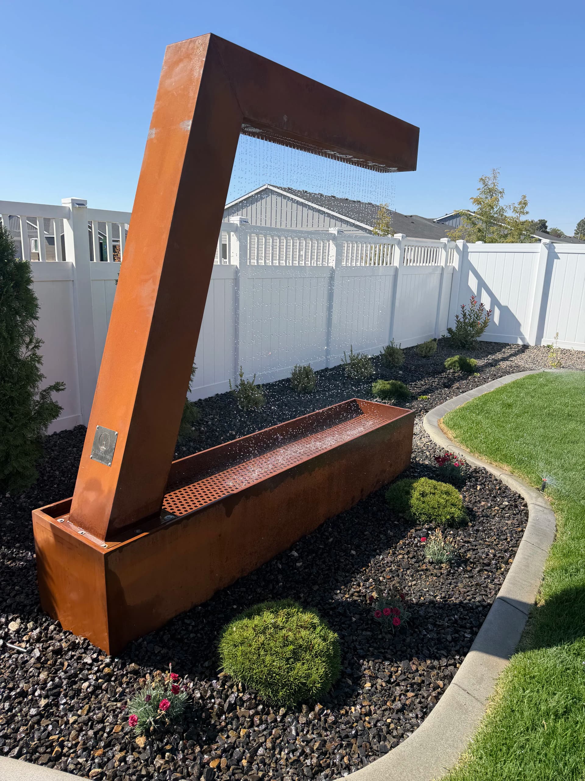 Gallery photos for Bare Dirt Backyard Gets a Full Landscape Build with Sod and Fountain: Image #1