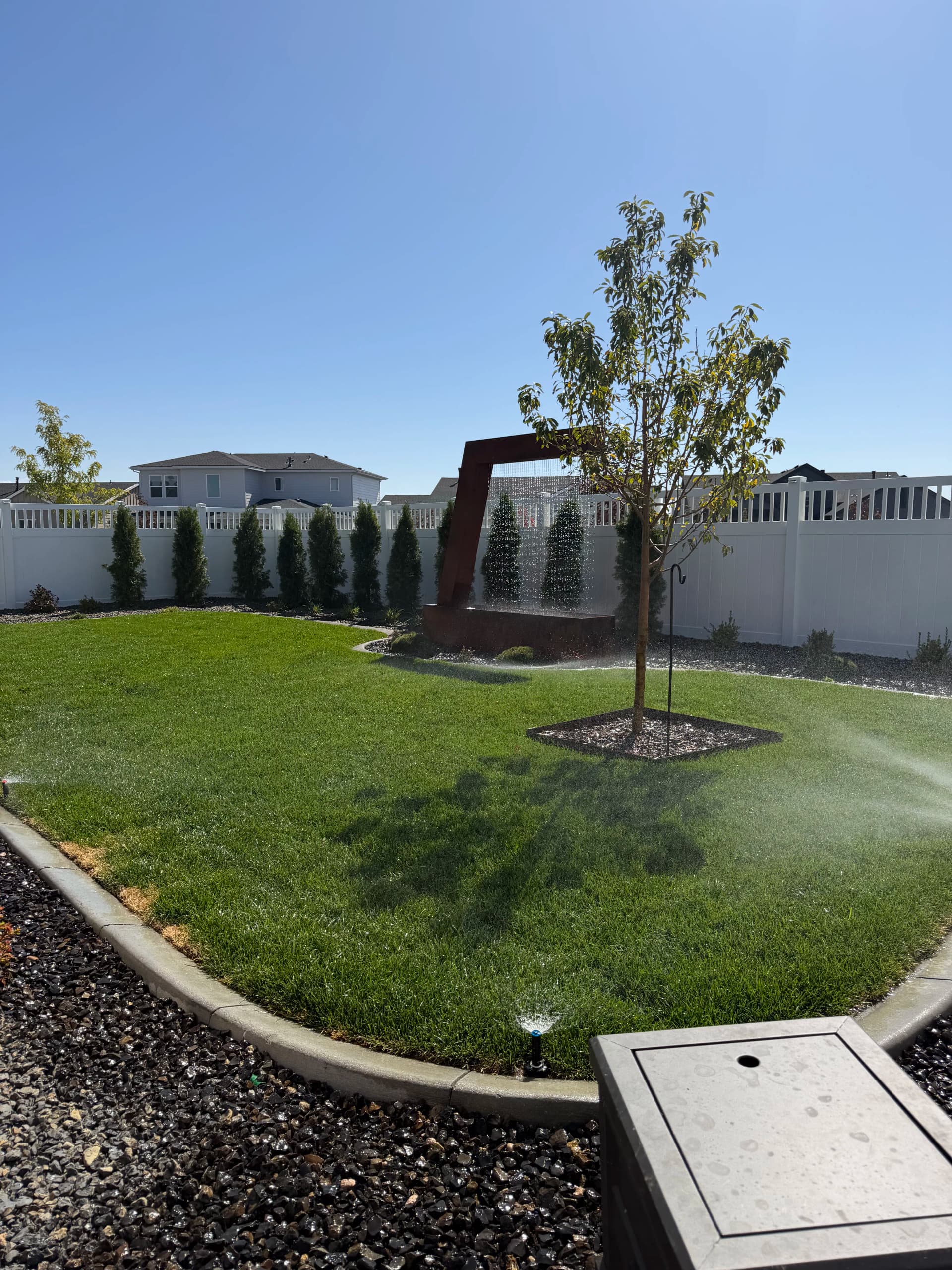 Gallery photos for Bare Dirt Backyard Gets a Full Landscape Build with Sod and Fountain: Image #2